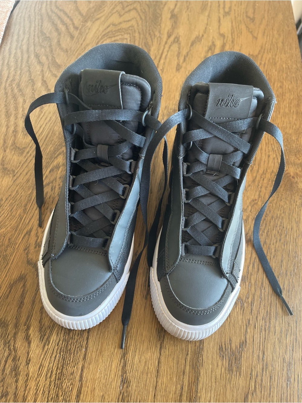 Nike Women’s Black and White High-Top Sneakers